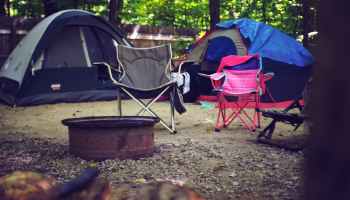 two pink and gray camping chairs
